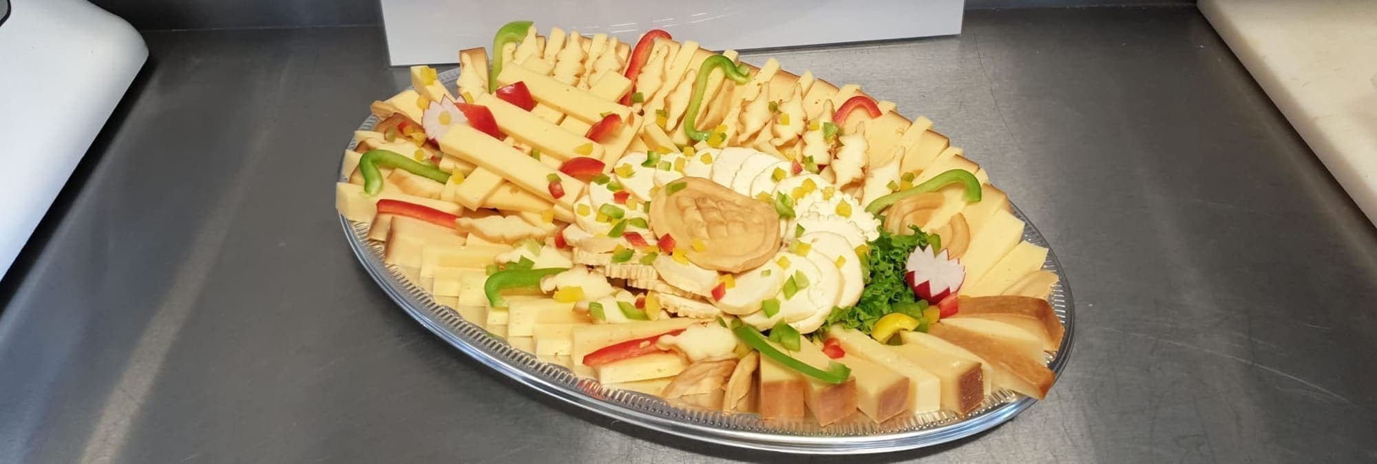 Platters of cold cuts, cheese and vegetables