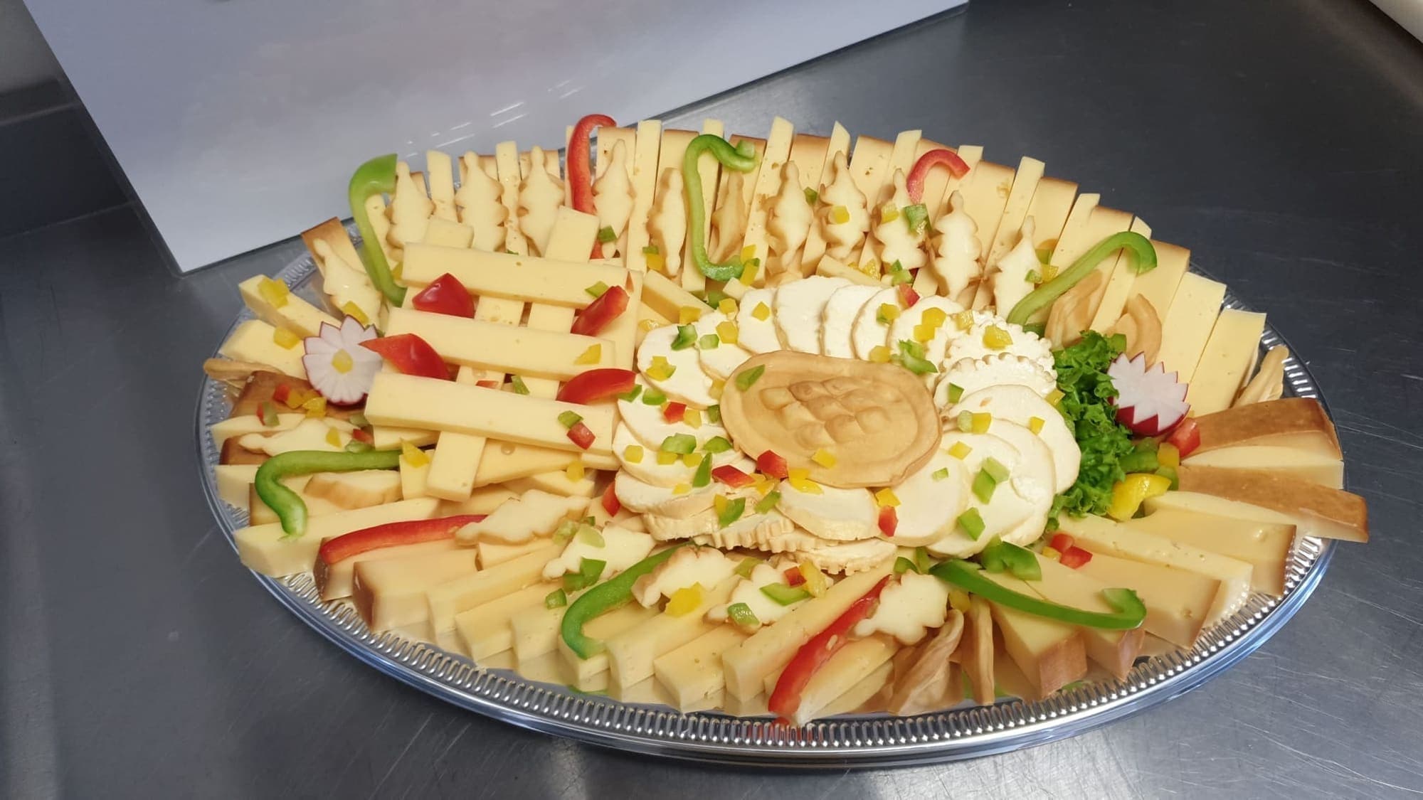 Platters of cold cuts, cheese and vegetables
